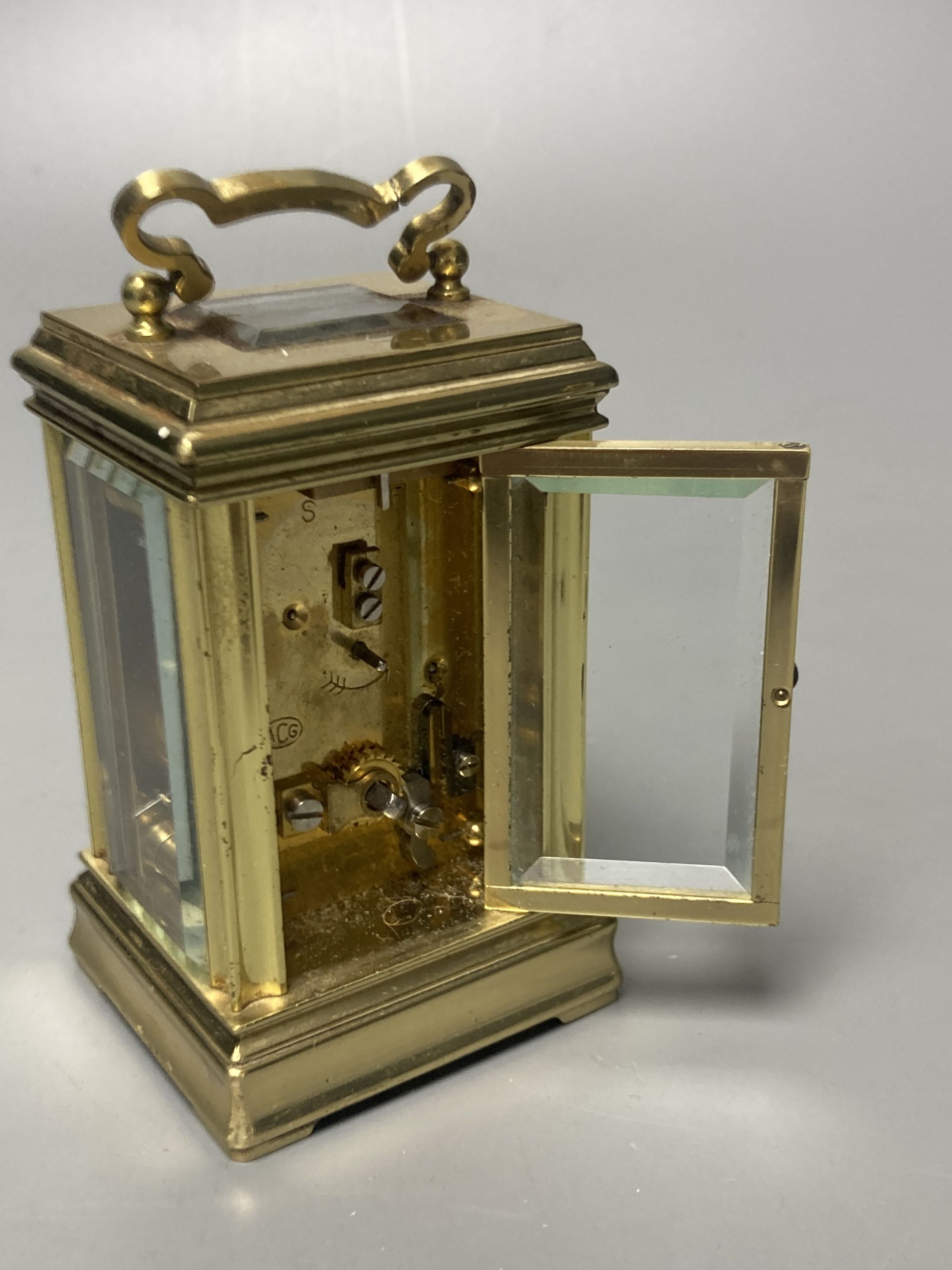 A 20th century miniature brass carriage timepiece, height 9cm